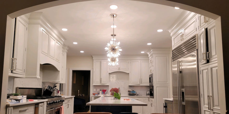 Updated recessed lighting
                                and Savant smart light switches